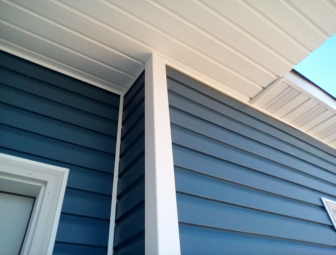 Modern house exterior with blue siding
