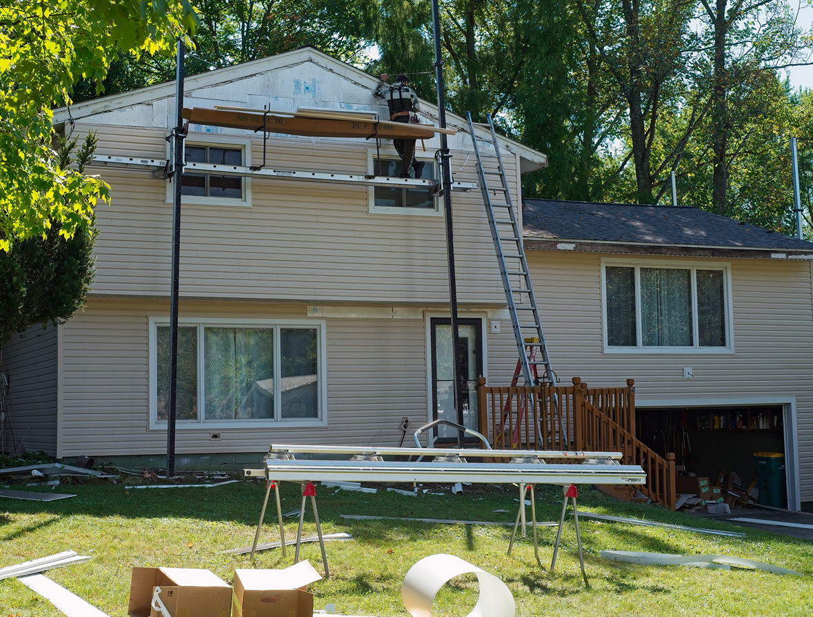 House under renovation with scaffolding